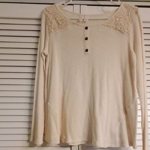 Ivory long sleeve with lacy top.